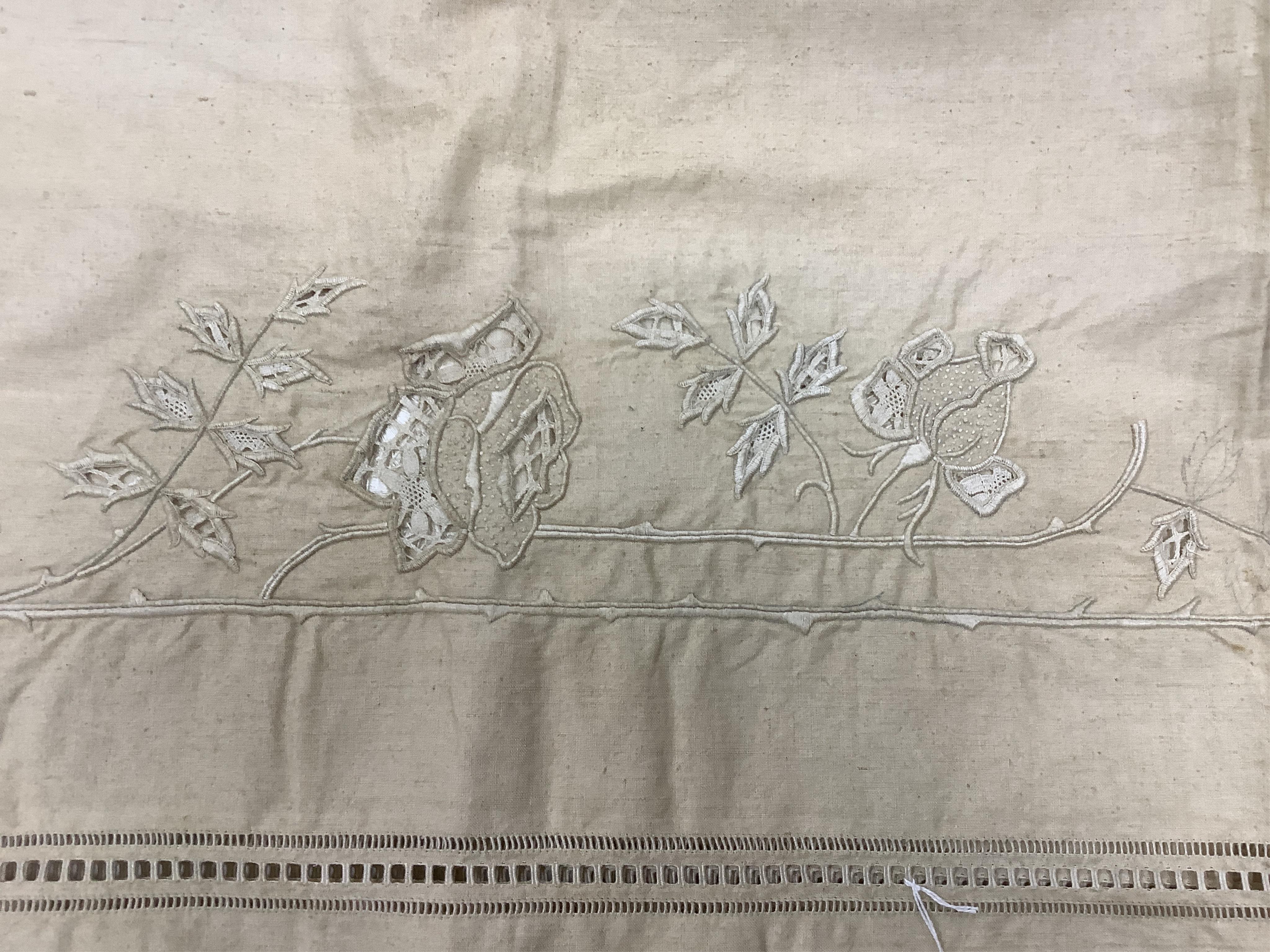 Four French provincial linen floral embroidered and drawn thread turn back, wide and long top sheets. Each sheet with different embroidery, dimensions and shades of linen, being ecru to off white. Condition - ecru sheet,